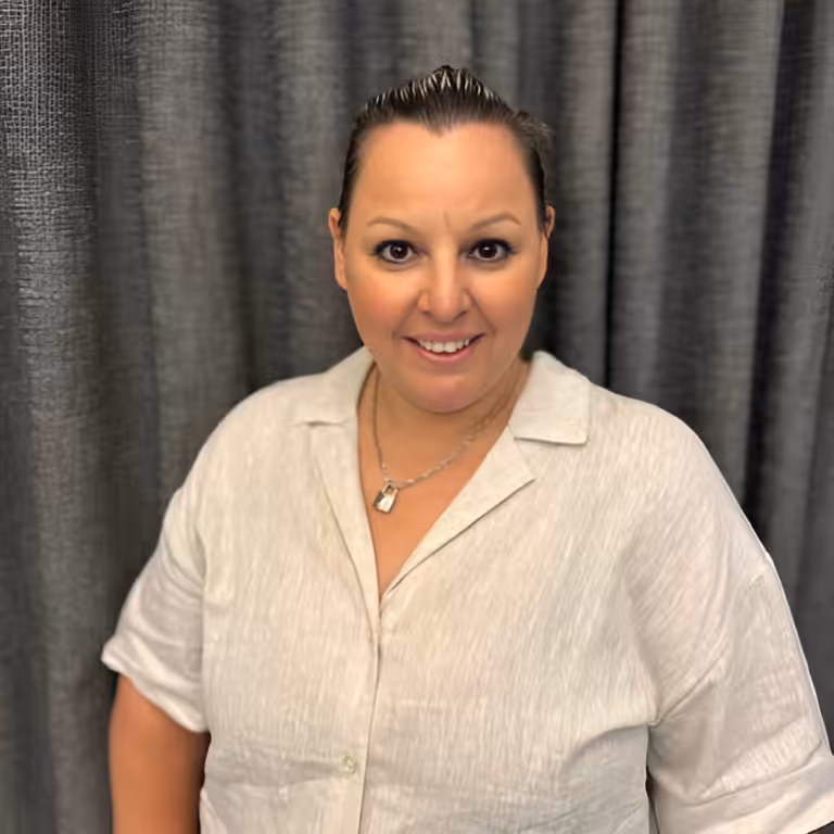 Mel Calci-Mossel, Operations Manager coordinating child care mentoring and service support